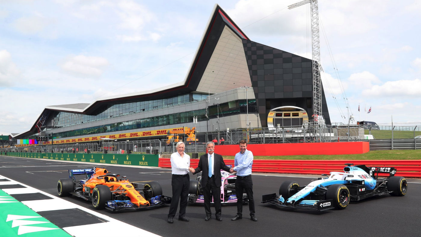F1 chief Chase Carey (centre) with British Racing Drivers’ Club chairman John Grant and Silverstone&#039;s Stuart Pringle 