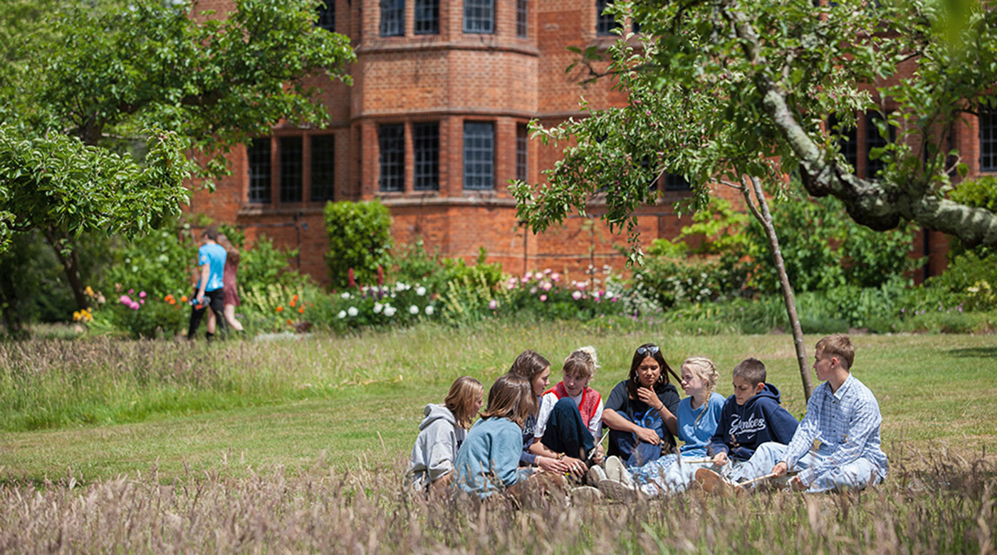 Bedales pupils chatting in the school gardens