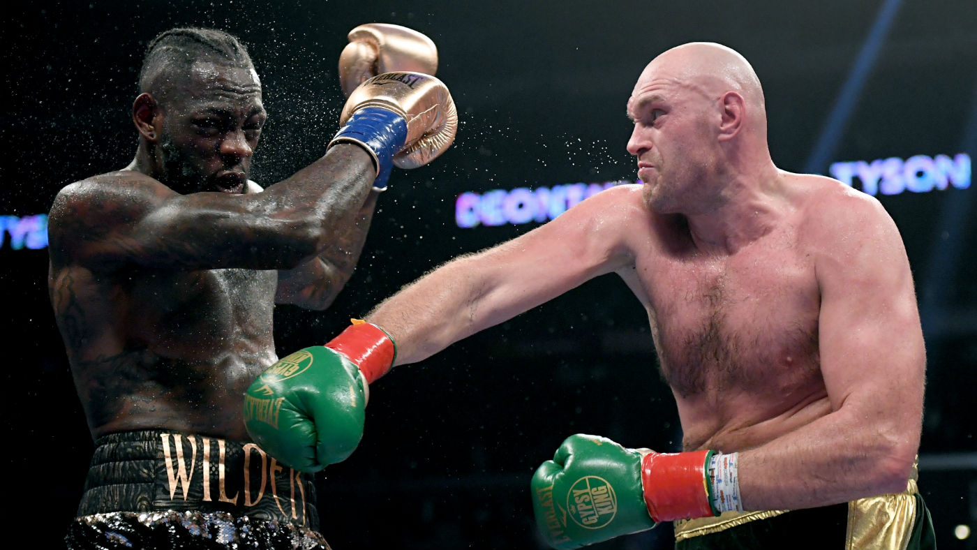 Tyson Fury hits Deontay Wilder during the drawn WBC heavyweight title fight in December 2018
