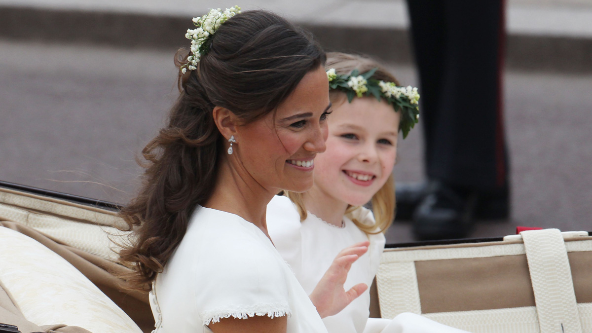 LONDON, ENGLAND - APRIL 29:Sister of the Bride and Maid of Honour Pippa Middleton and bridesmaid Margarita Armstrong-Jones make the journey by carriage procession to Buckingham Palace followi