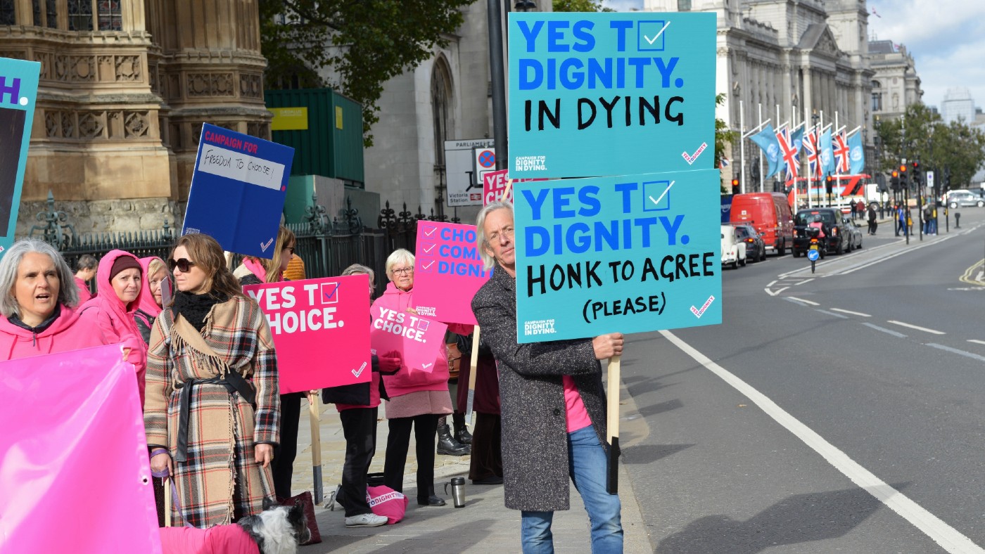 Placards showing support for legalising assisted dying 