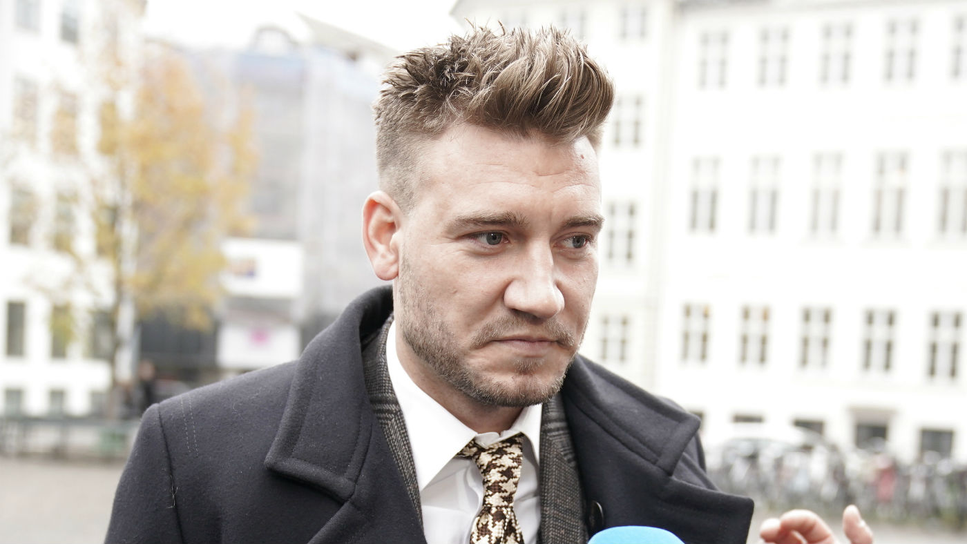 Rosenborg and Denmark striker Nicklas Bendtner arrives for a hearing in Copenhagen
