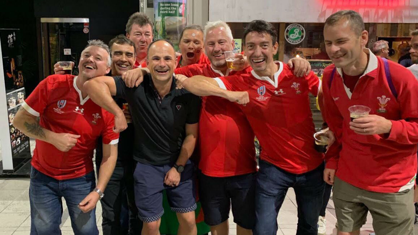 Referee Jaco Peyper was pictured with Wales fans after the match against France  