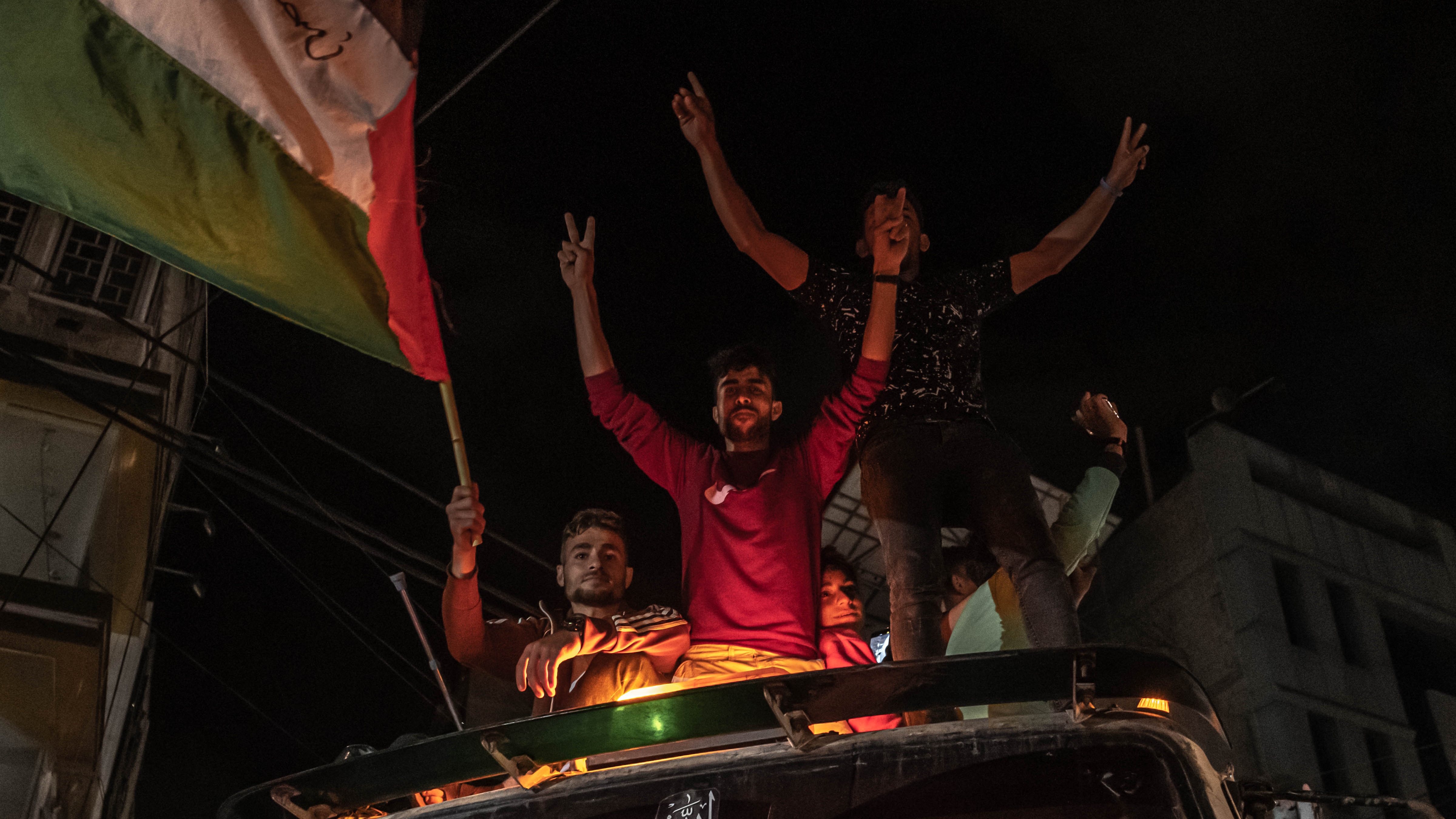 Palestinians in Gaza City celebrate the ceasefire