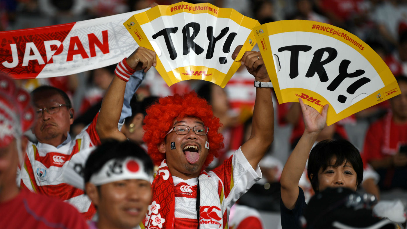 Japan fans hold aloft ‘try’ signs ahead of the first match