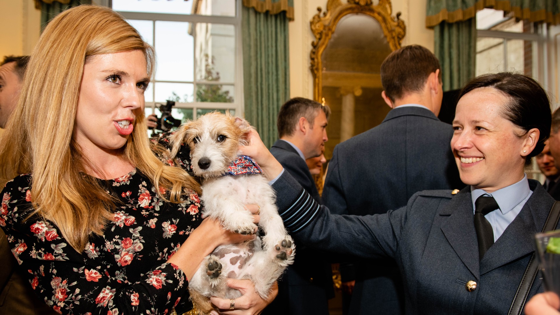 Carrie Symonds, holding her dog Dilyn