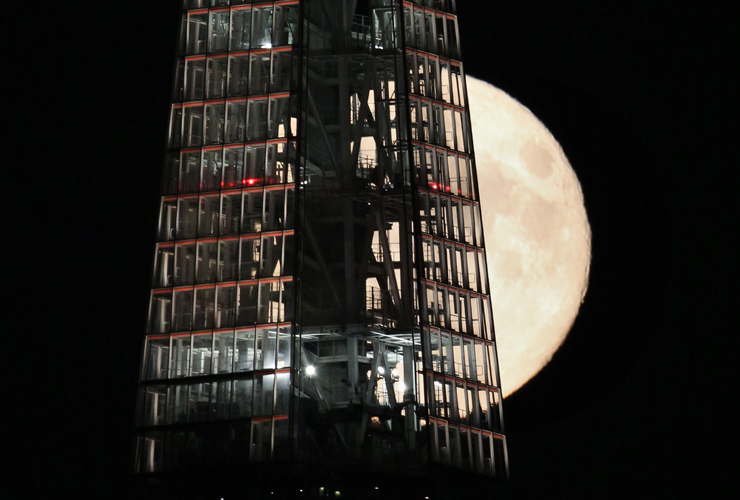 Supermoon passes behind the Shard in London