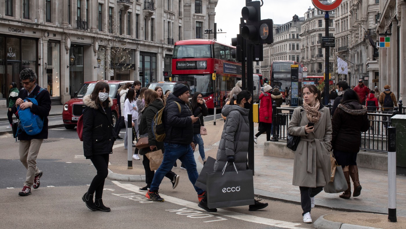 Shoppers get their retail fix on Oxford Street in London on 12 April  