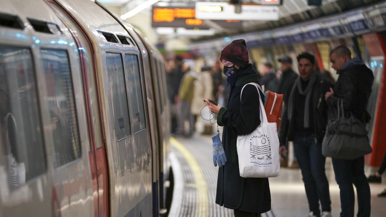 A passenger on the London Underground wearing a face mask