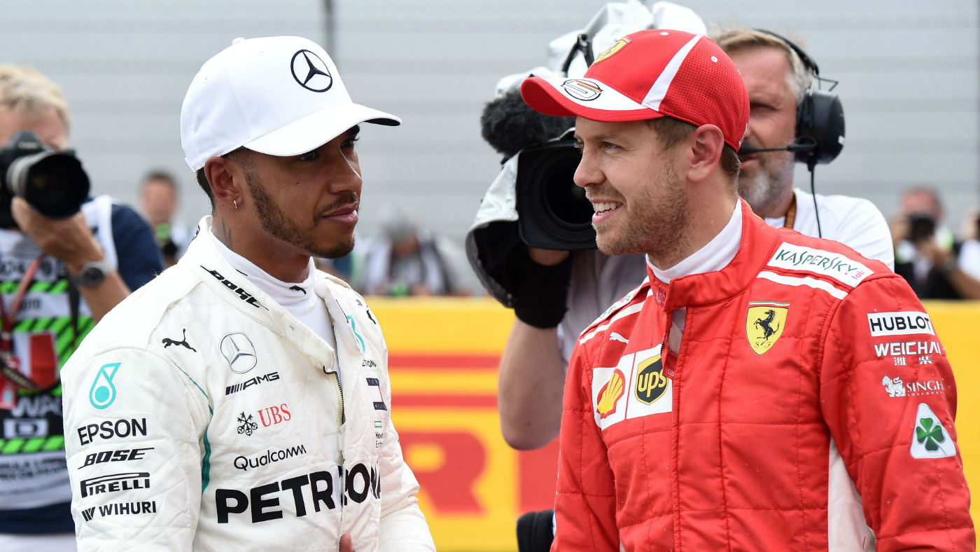 Mercedes driver Lewis Hamilton and his F1 title rival Sebastian Vettel of Ferrari