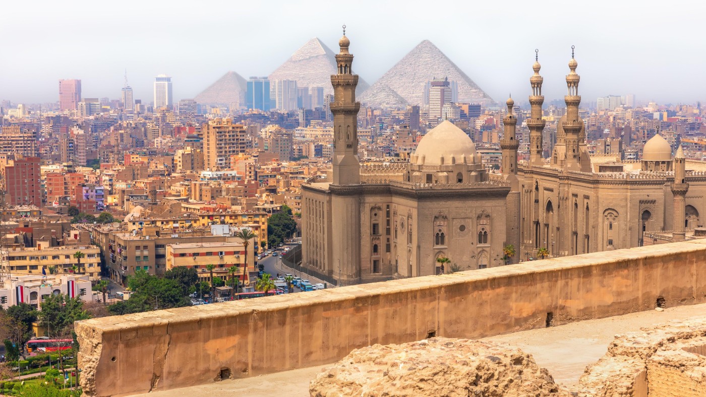The mosque-madrasah of Sultan Hassan and the pyramids of Cairo