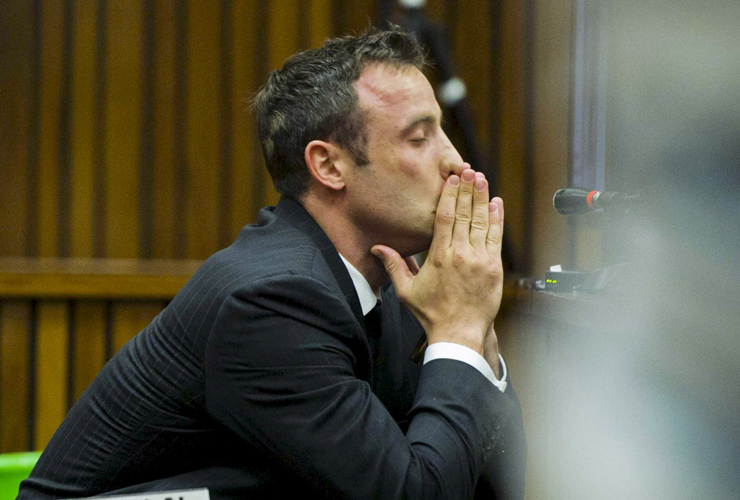 PRETORIA, SOUTH AFRICA - MARCH 13 (SOUTH AFRICA OUT):Oscar Pistorius at the Pretoria High Court on March 13, 2014, in Pretoria, South Africa. Pistorius, stands accused of the murder of his gi