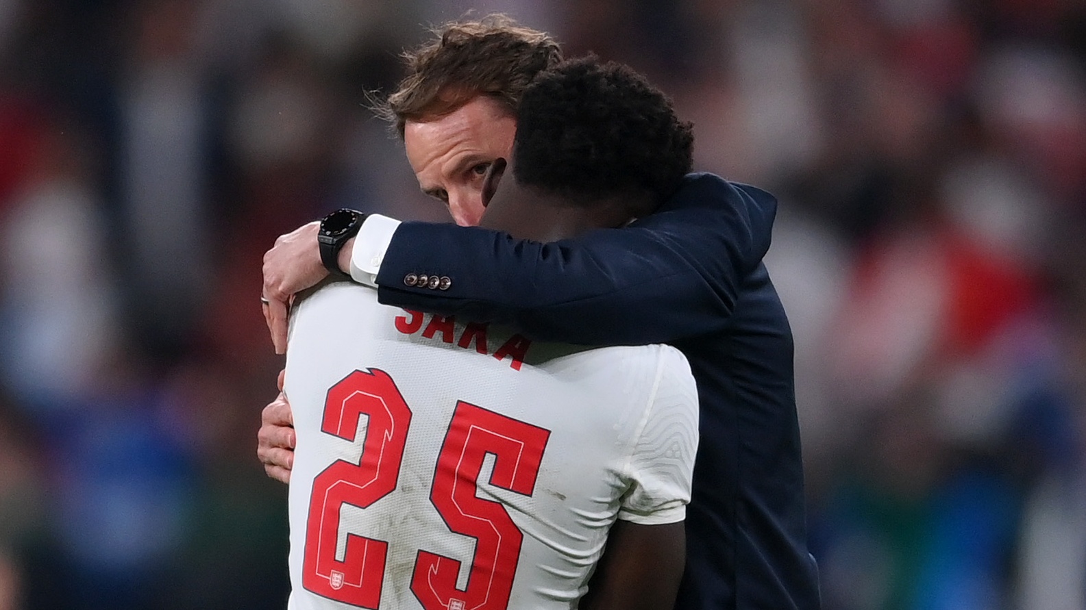 Gareth Southgate consoles Bukayo Saka after England’s defeat