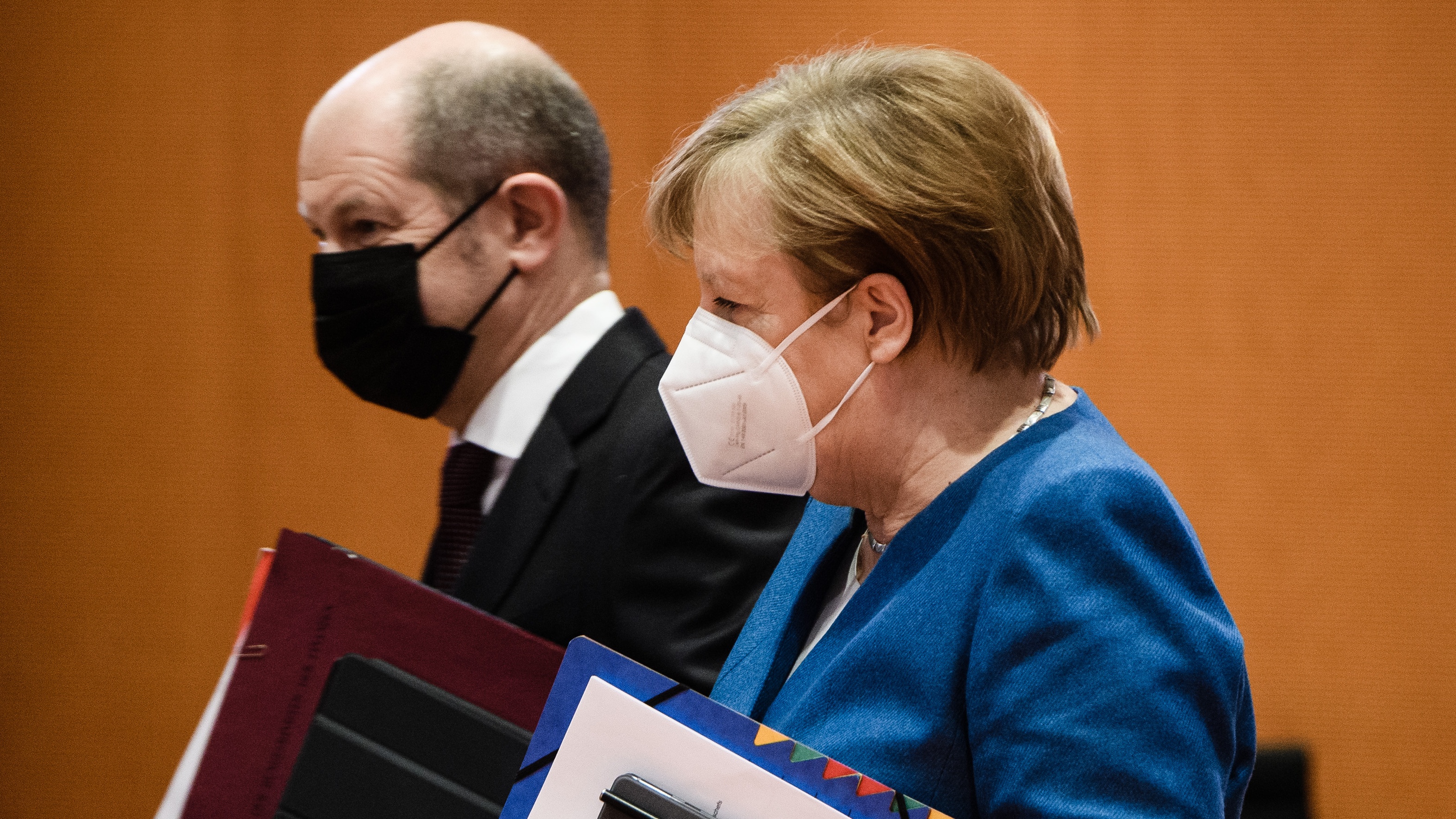SPD leader Olaf Scholz with CDU Chancellor Angela Merkel