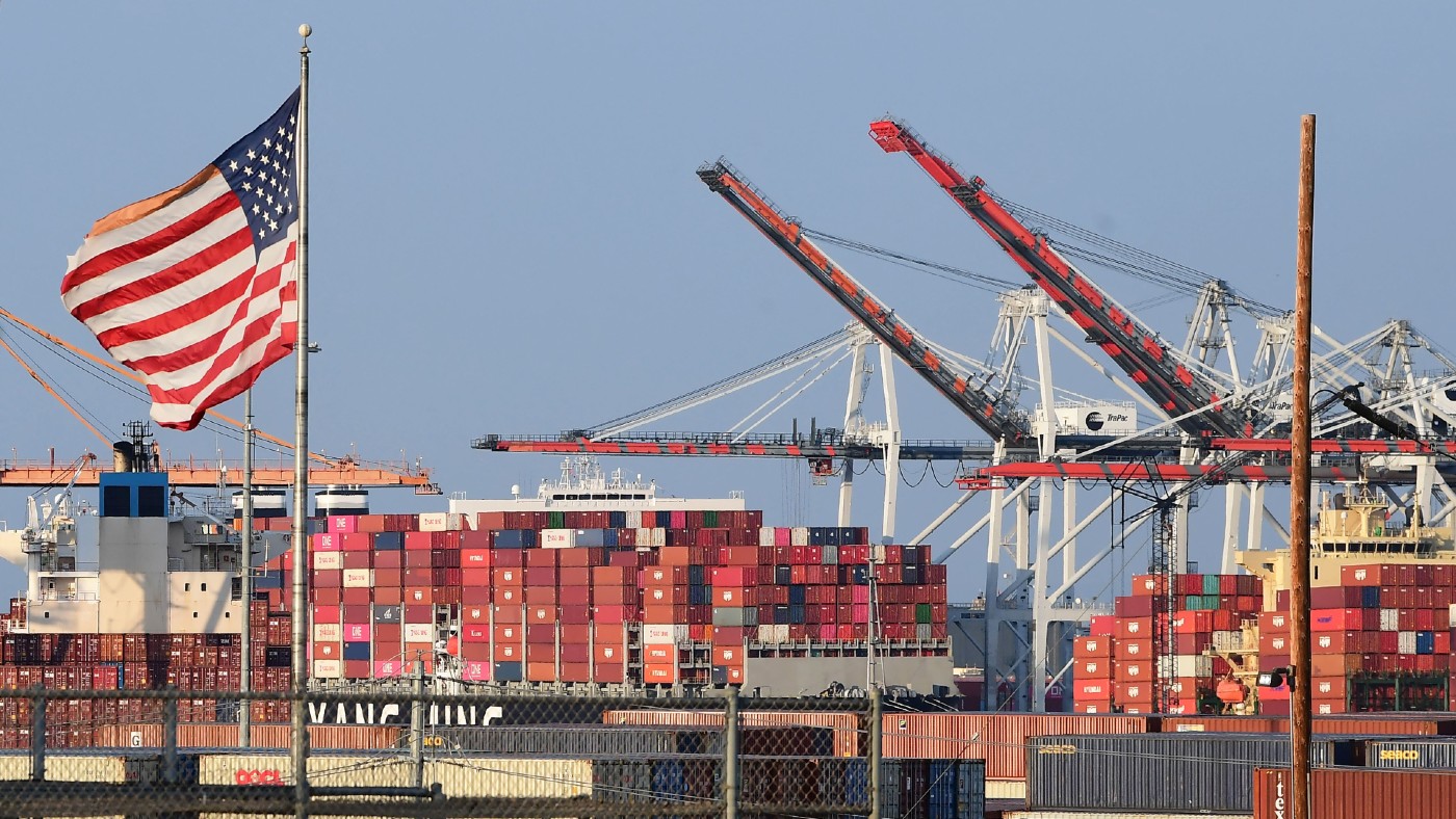 Containers stacked high on a cargo ship at the Port of Los Angeles