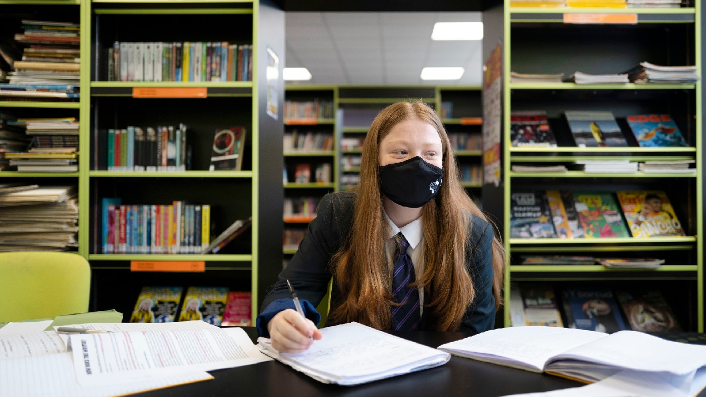 Girl at school wearing a facemask