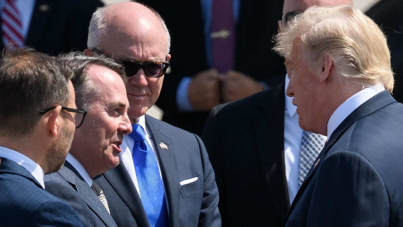 LIam Fox greets Donald Trump during his visit to the UK in the summer