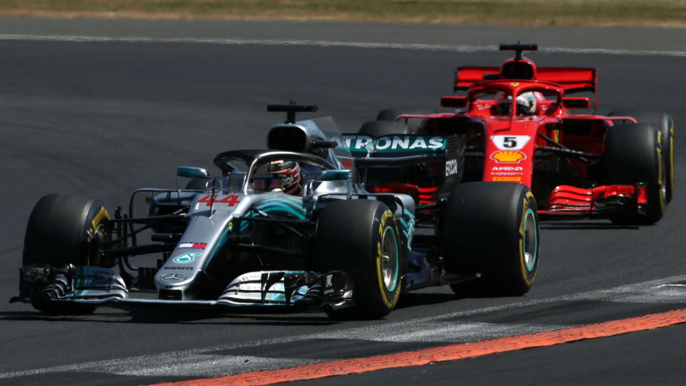 Mercedes driver Lewis Hamilton races against Ferrari’s Sebastian Vettel