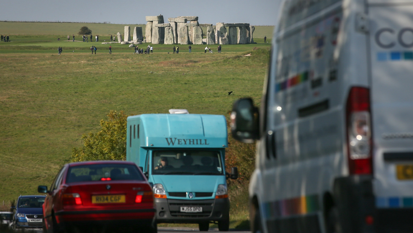 Traffic passing Stonehenge