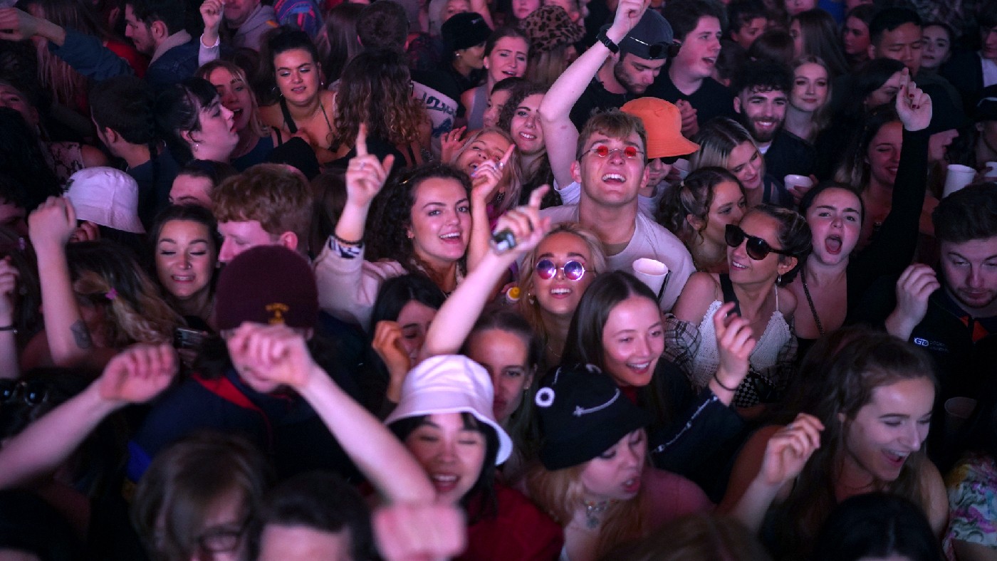 Concert-goers in a mosh pit