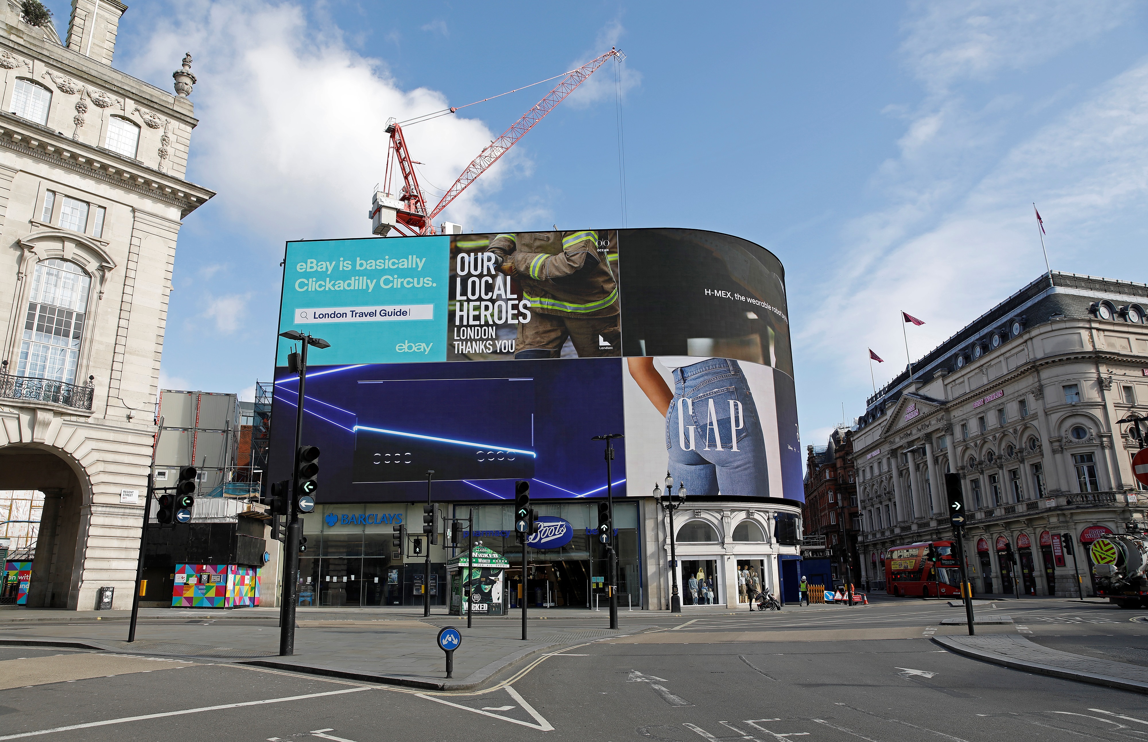 The electronic billboard displays an advert thanking Britain&#039;s emergency services for their dedication during the COVID-19 pandemic, in an empty in Piccadilly Circu in London on April 2, 2020
