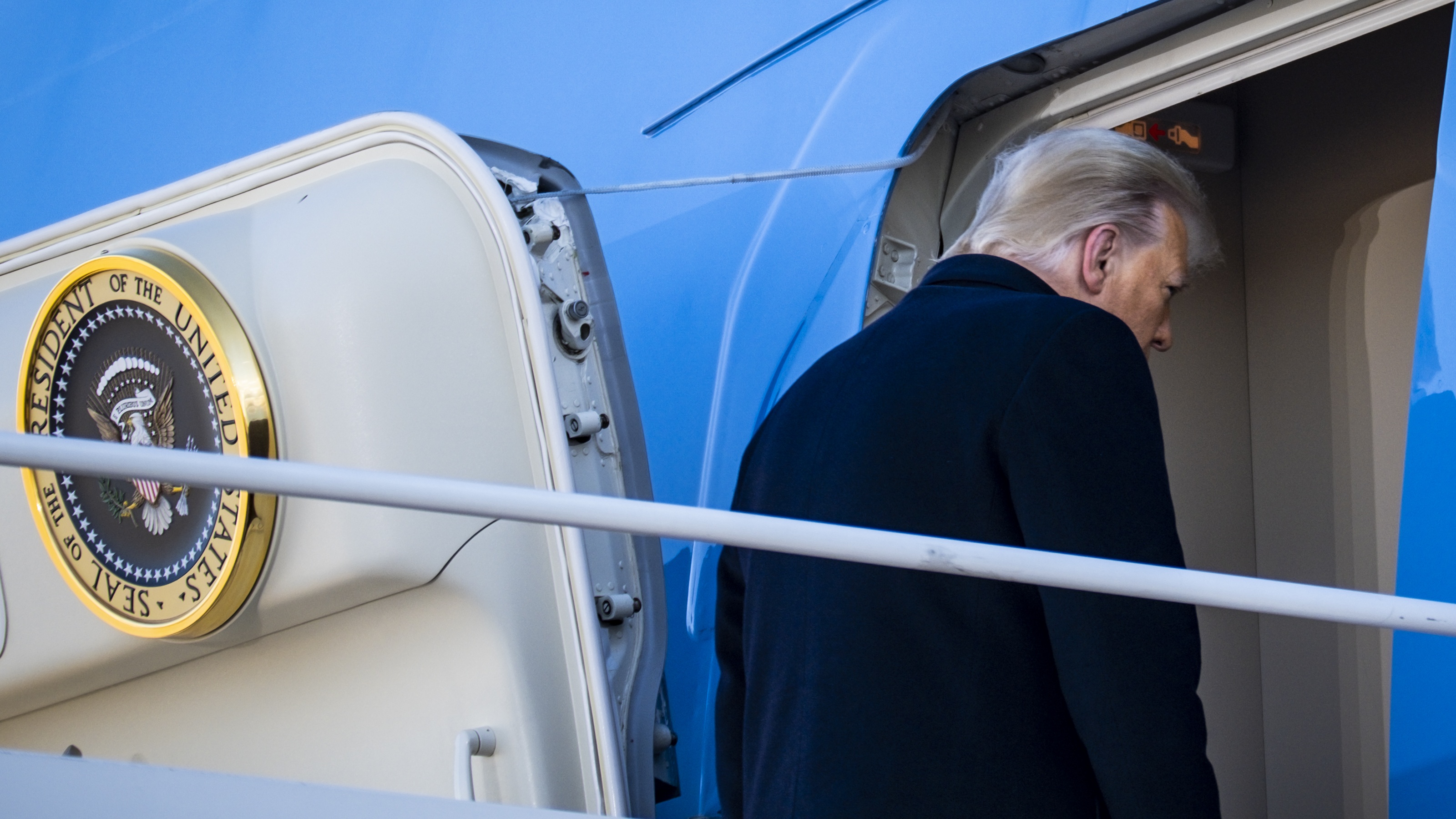 President Donald Trump boards Air Force One at Joint Base Andrews