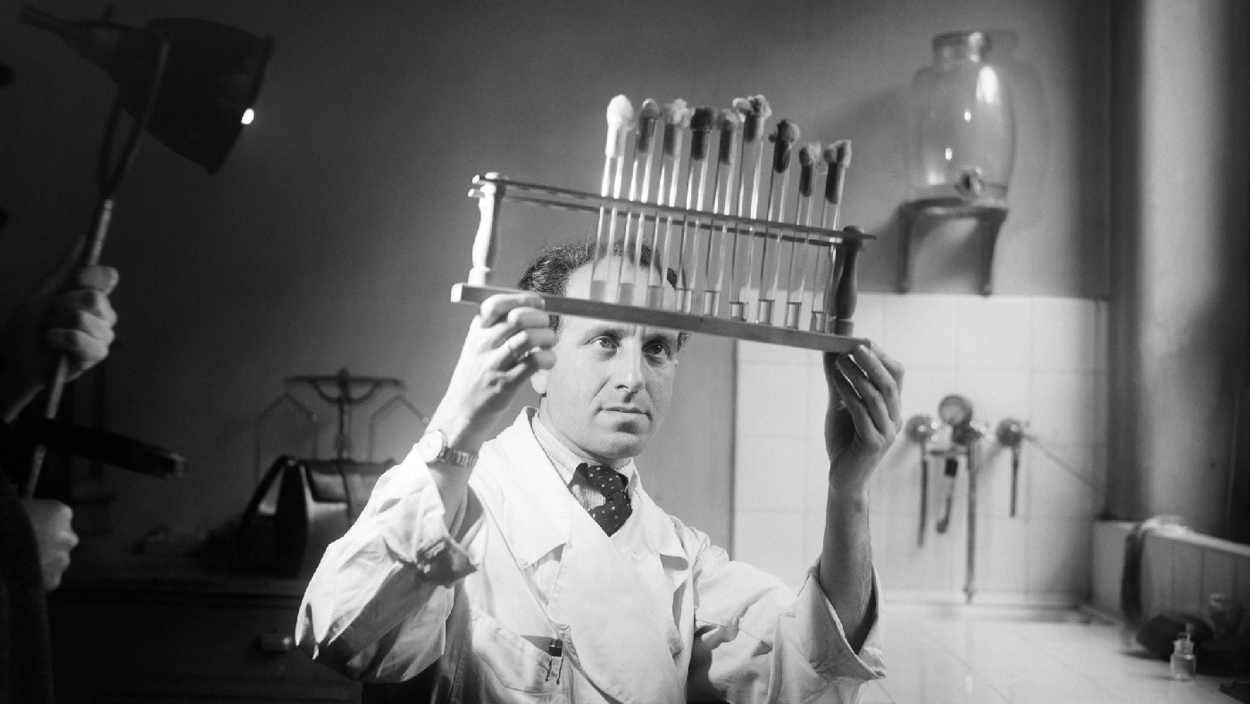 A medical researcher tests penicillin in a laboratory in Paris in 1945