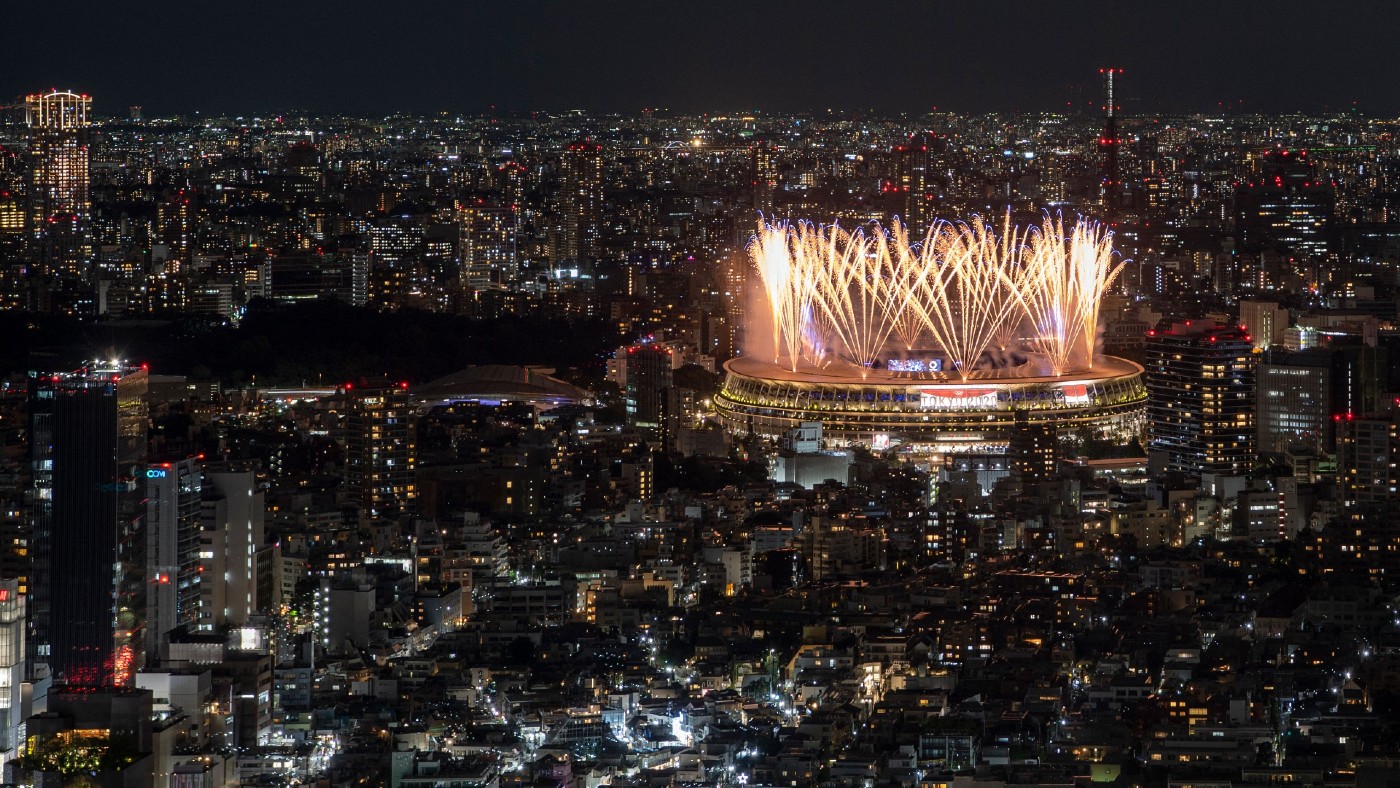 Fireworks light up the sky over the Olympic Stadium in Tokyo  