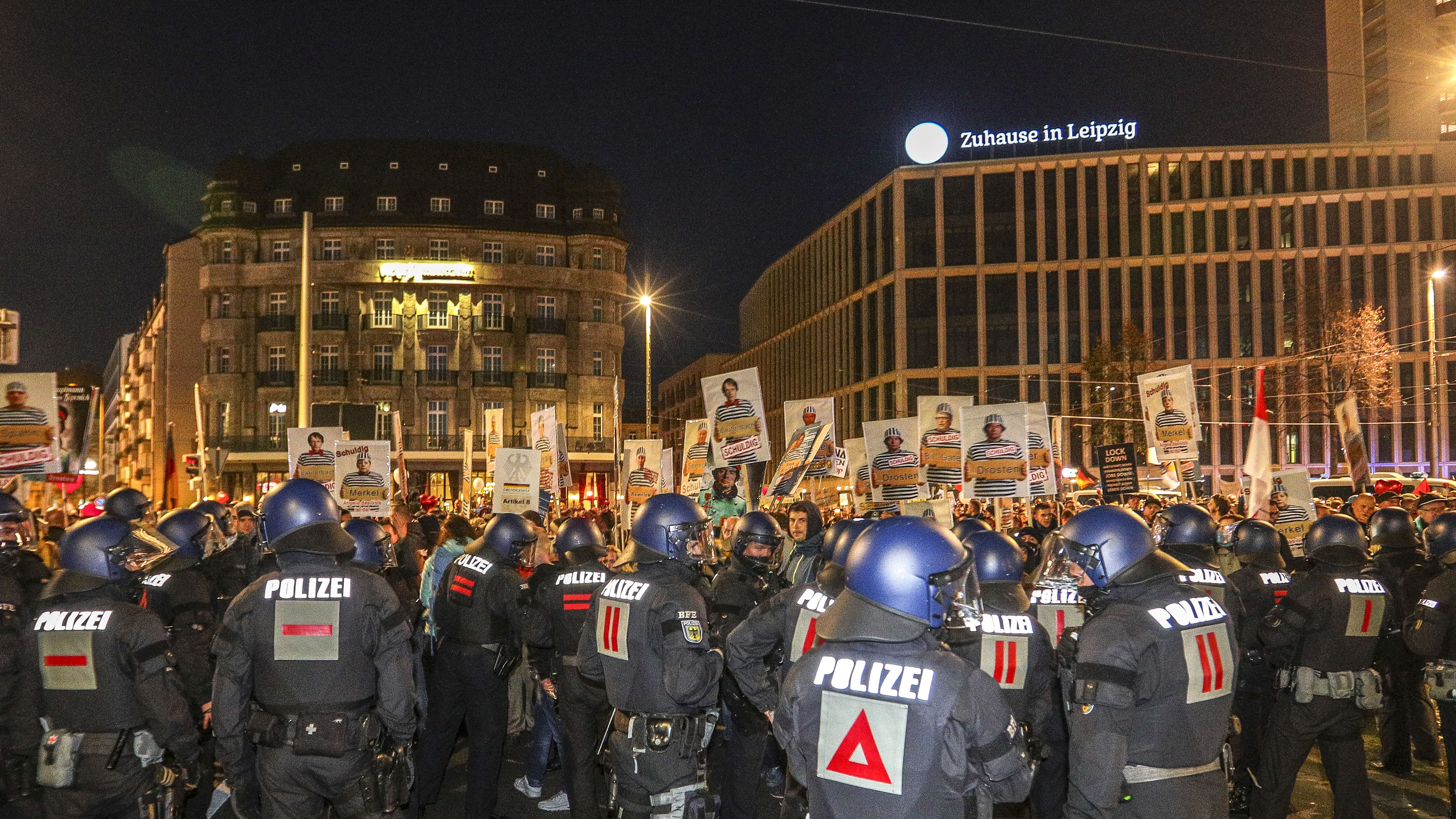 German riot police clash with Querdenker protesters in Leipzig