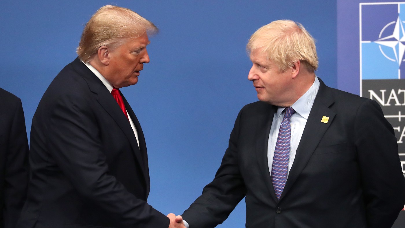 Boris Johnson shakes hands with Donald Trump