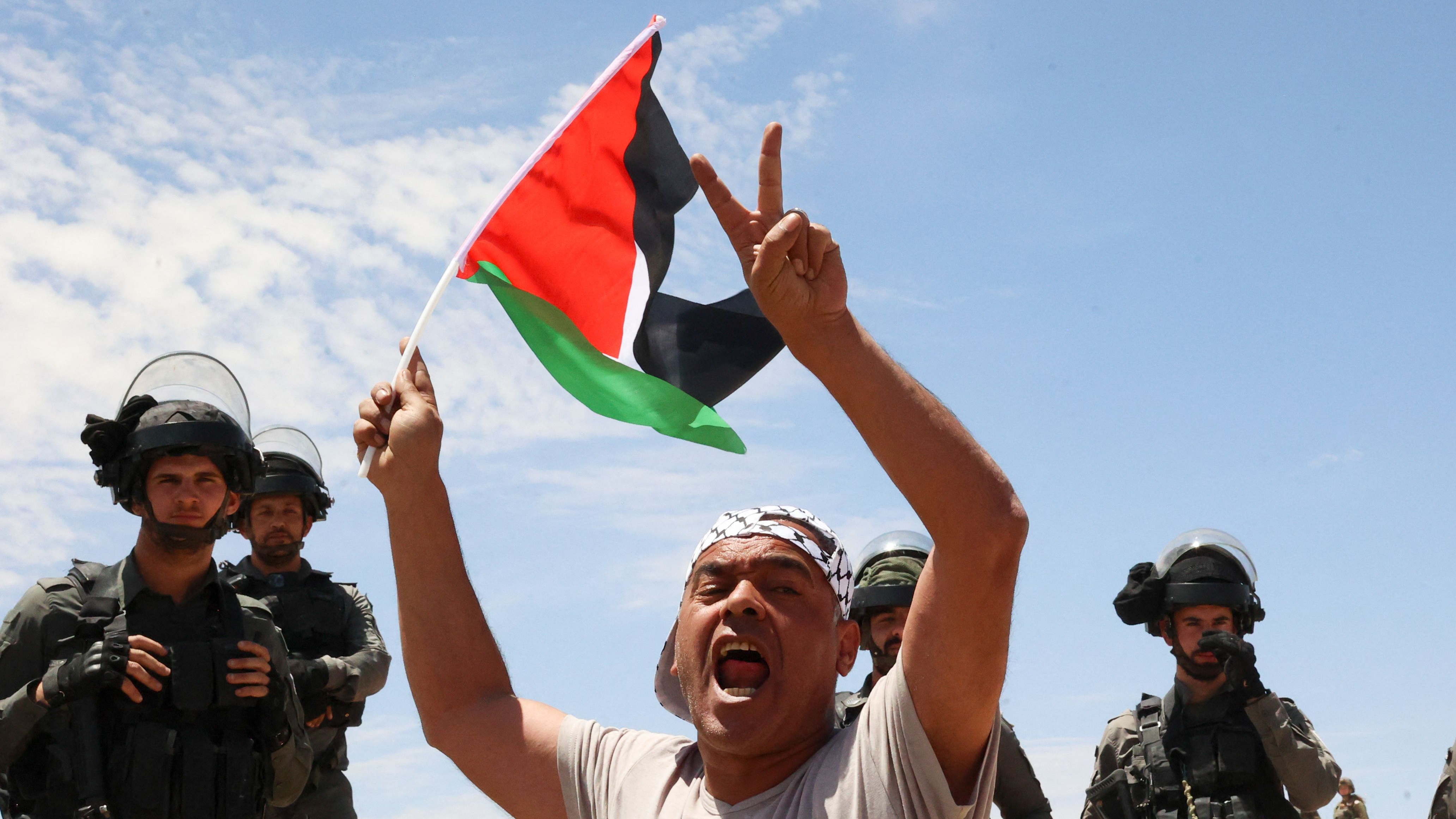 A Palestinian man demonstrates against the evictions
