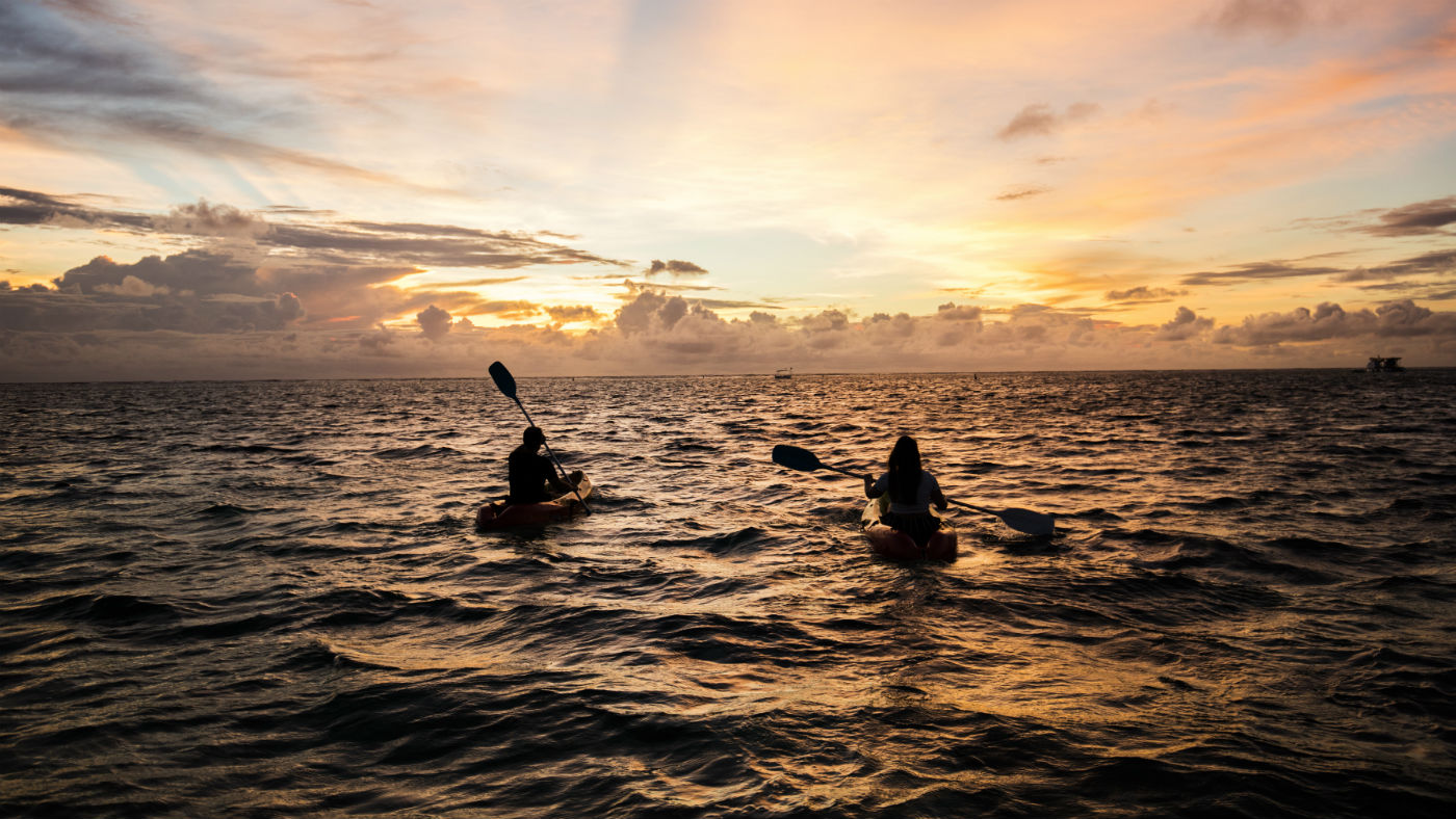 Kayakers at sunset 