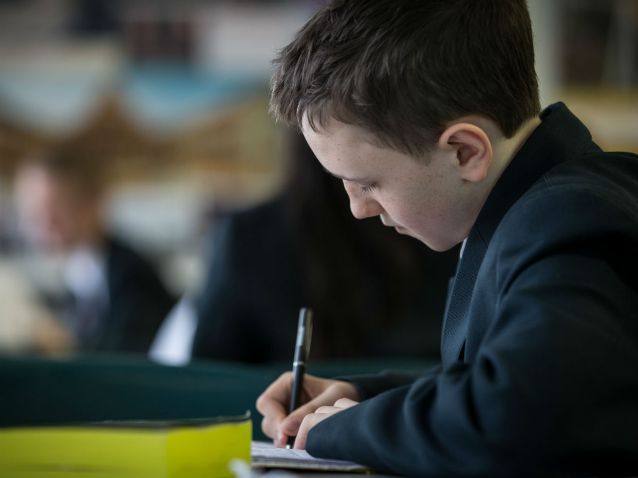 A pupil writing