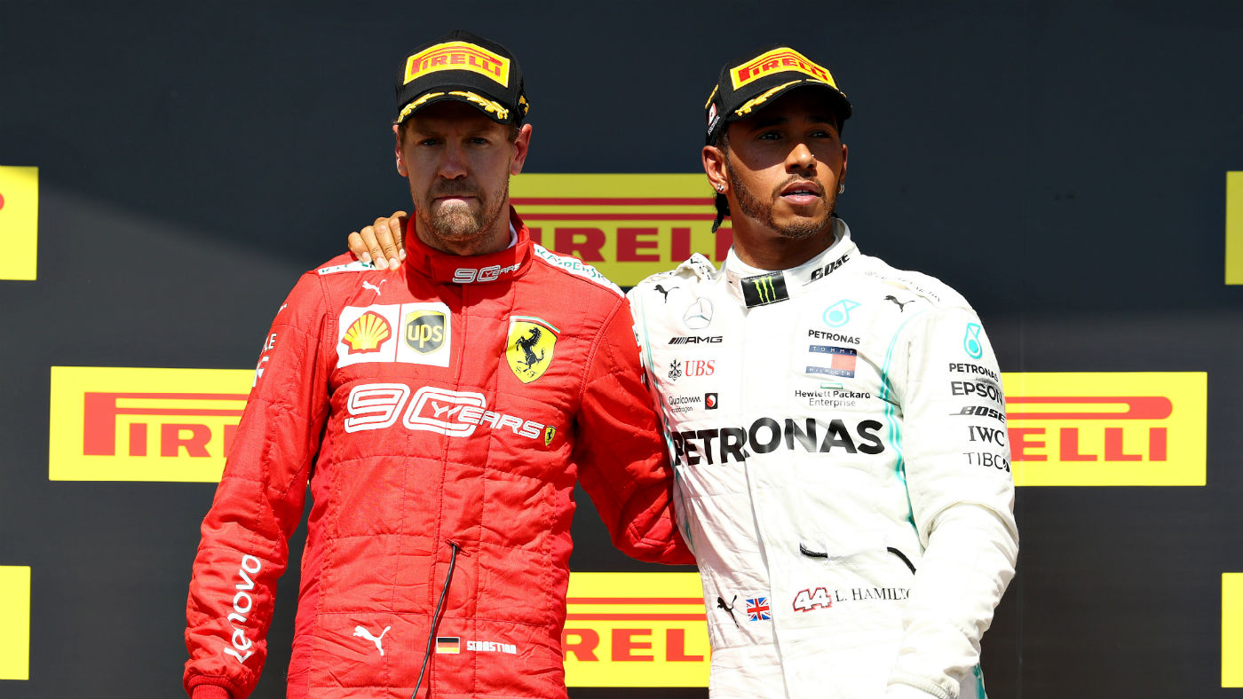 Ferrari’s Sebastian Vettel and Mercedes driver Lewis Hamilton on the podium in Canada