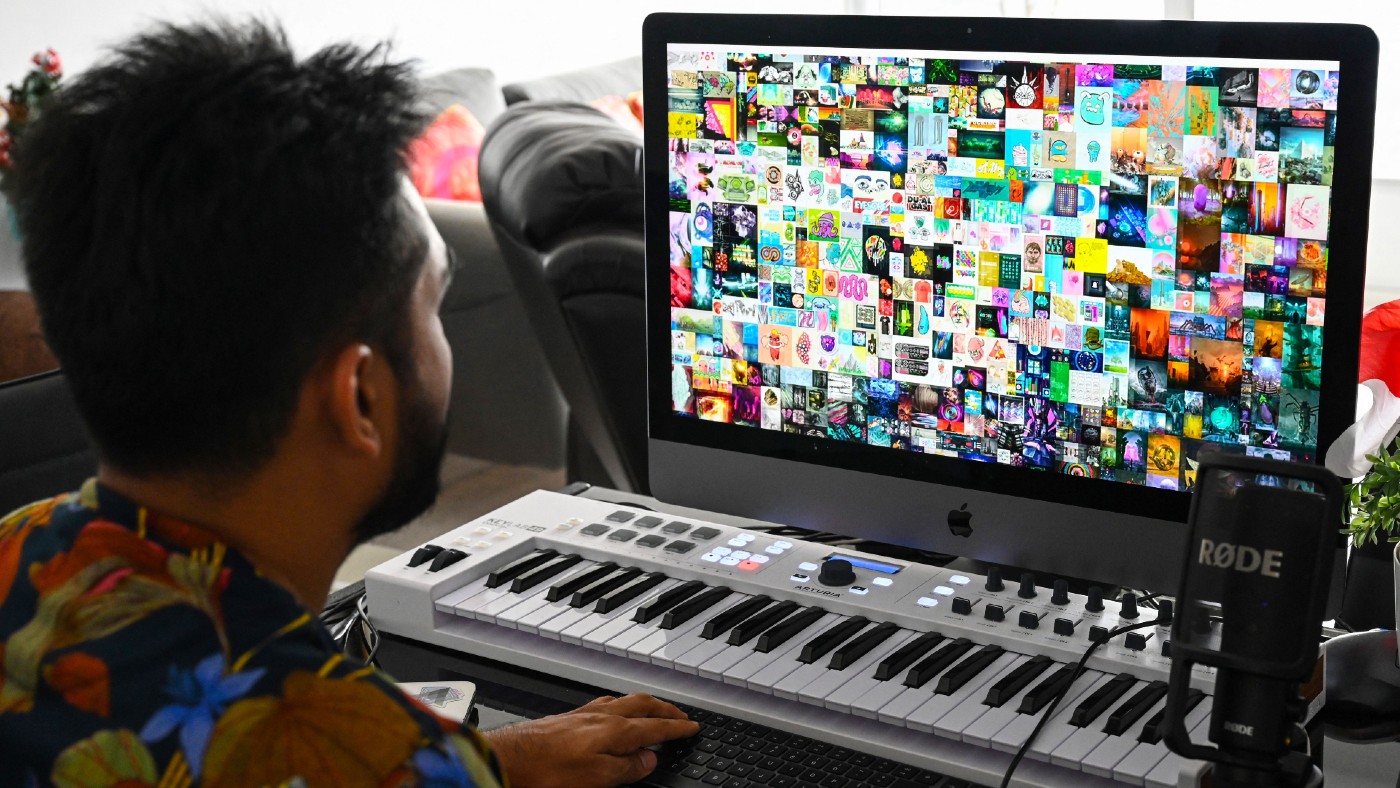 Vignesh Sundaresan with the artwork up on his computer
