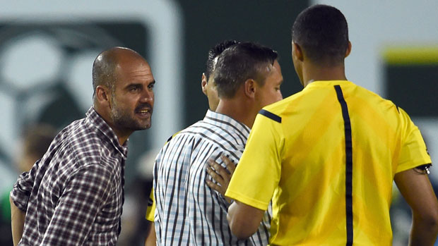 Bayern Munich coach Pep Guardiola argues with the referee during an MLS All-Star game