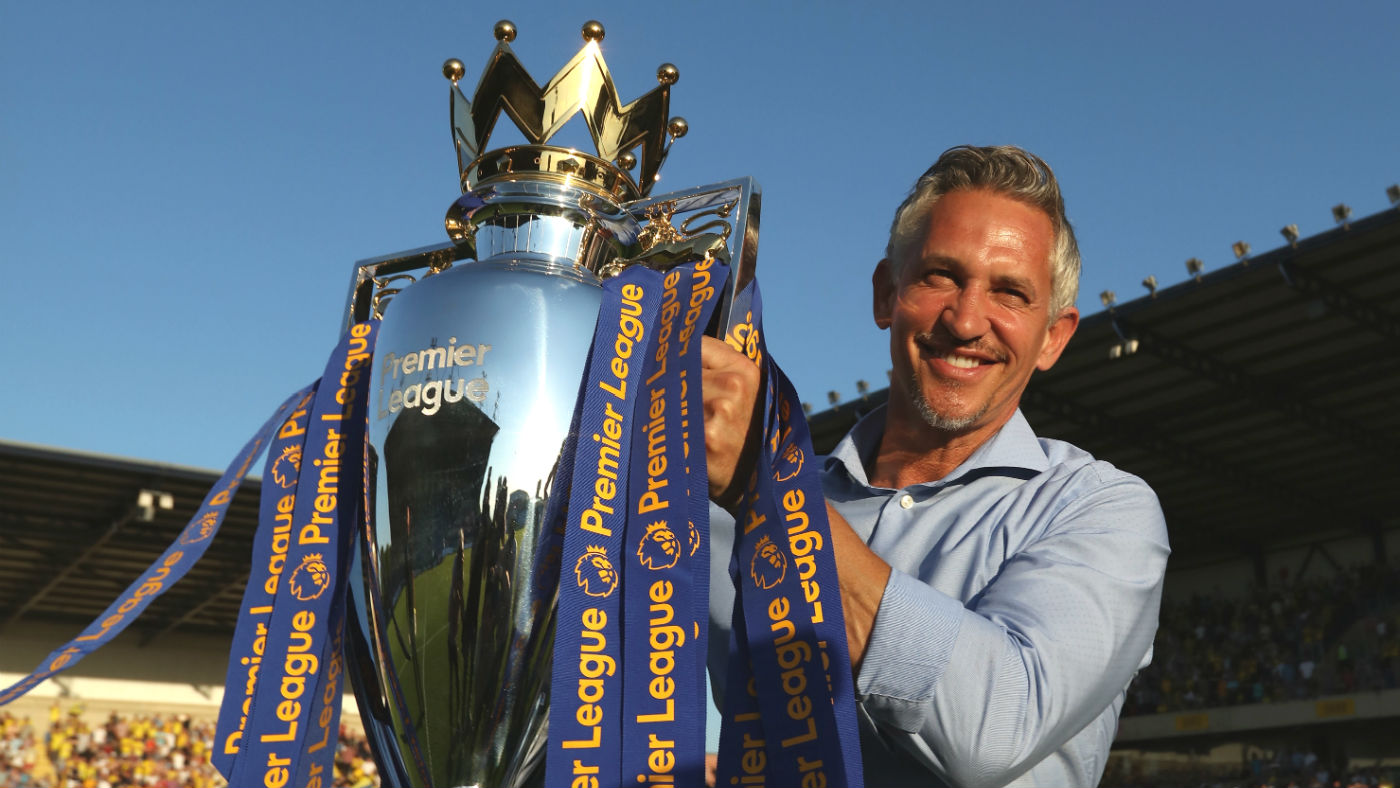 Gary Lineker poses with the Premier League trophy 