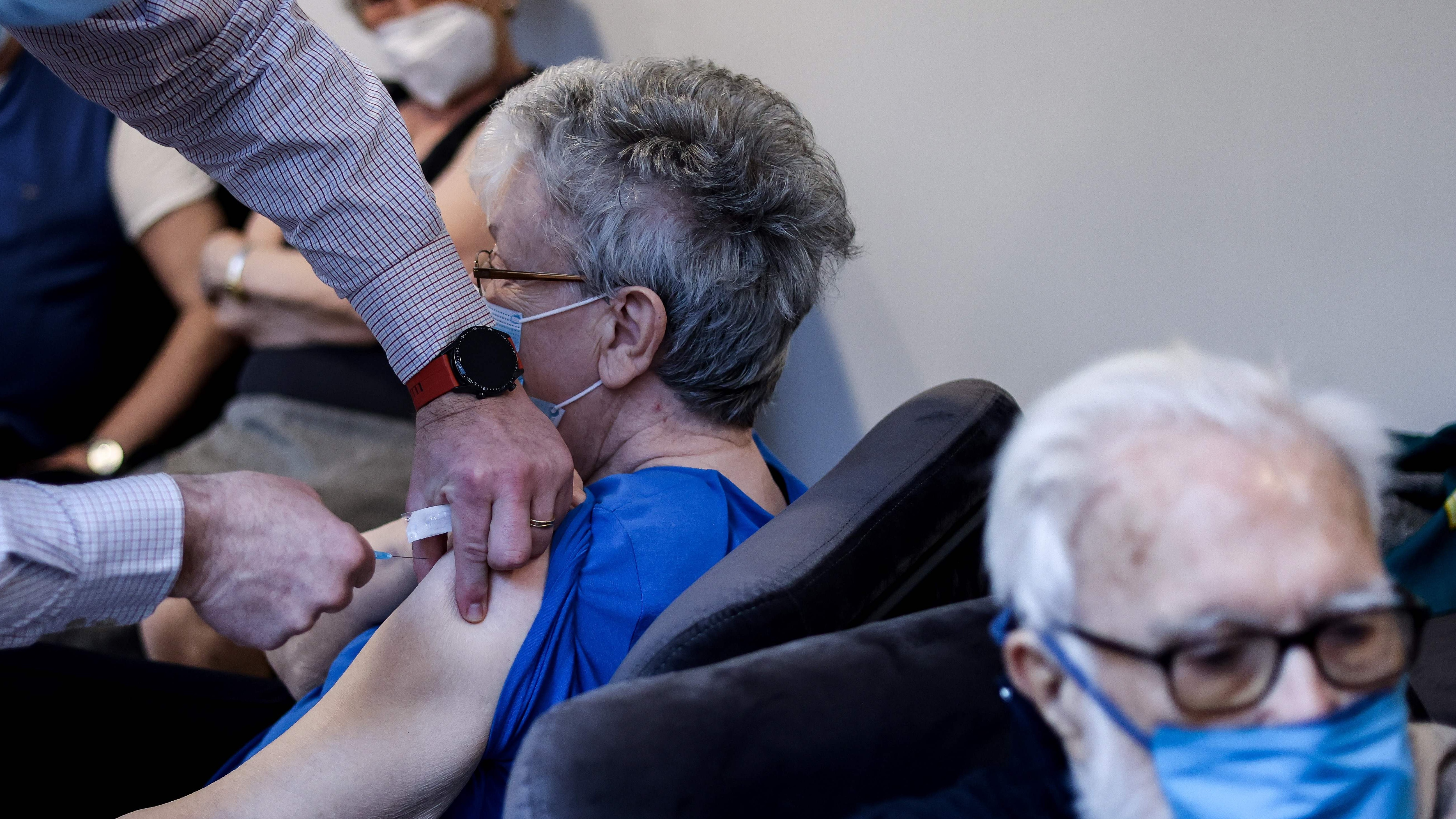 Residents at a care home in Belgium receive the Covid vaccine