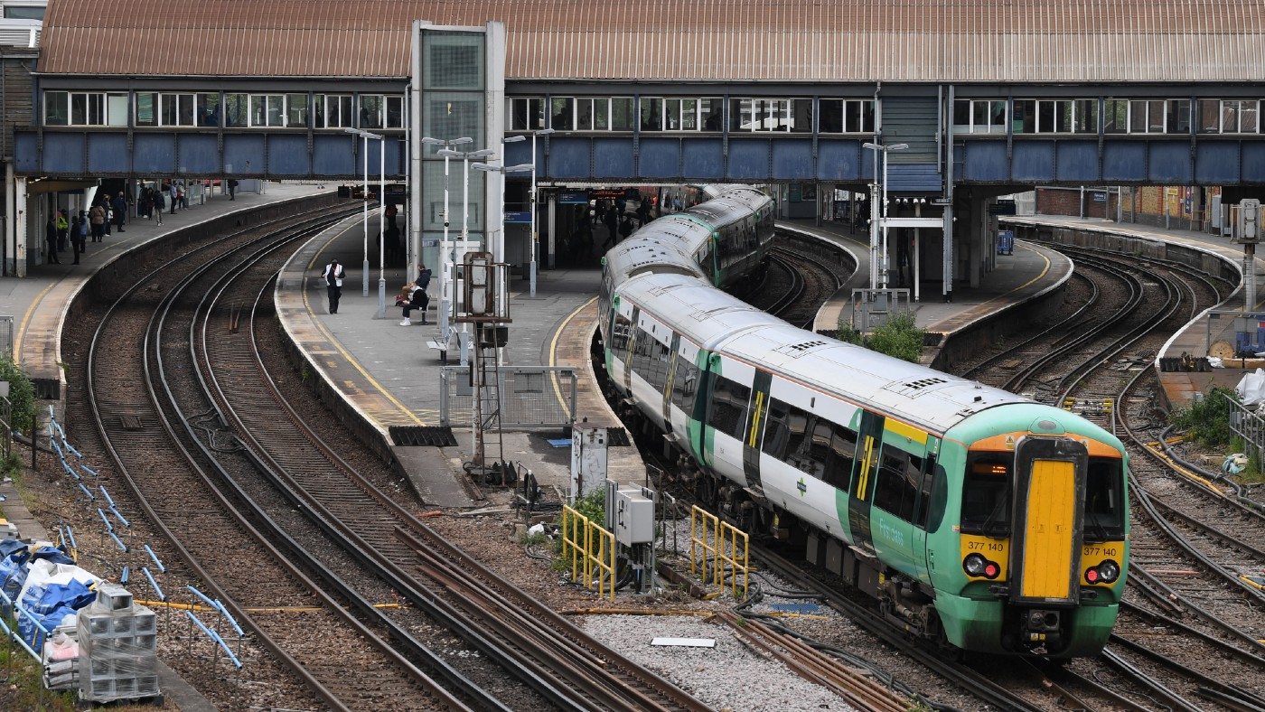 A Southern Rail train leaves Clapham Junction station in London 