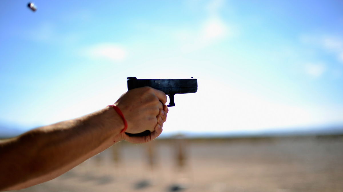 A pistol is fired at a US gun show