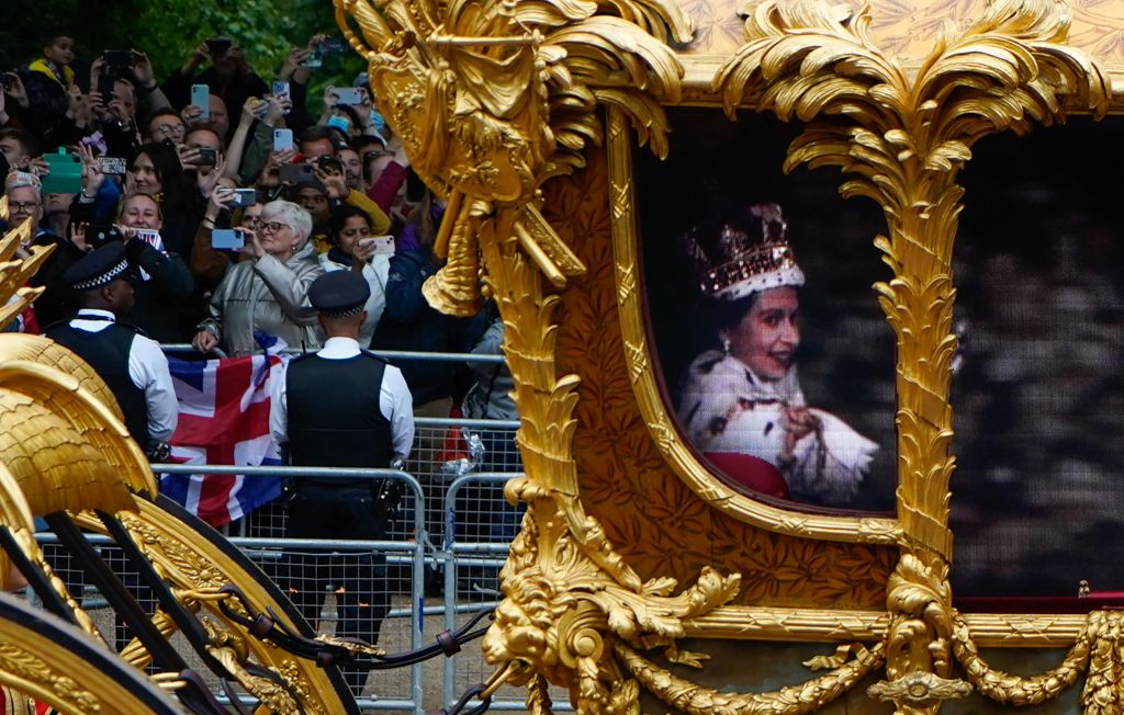Hologram of the Queen in the Gold State Coach