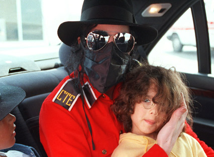 Michael Jackson with an unidentified boy in 1993