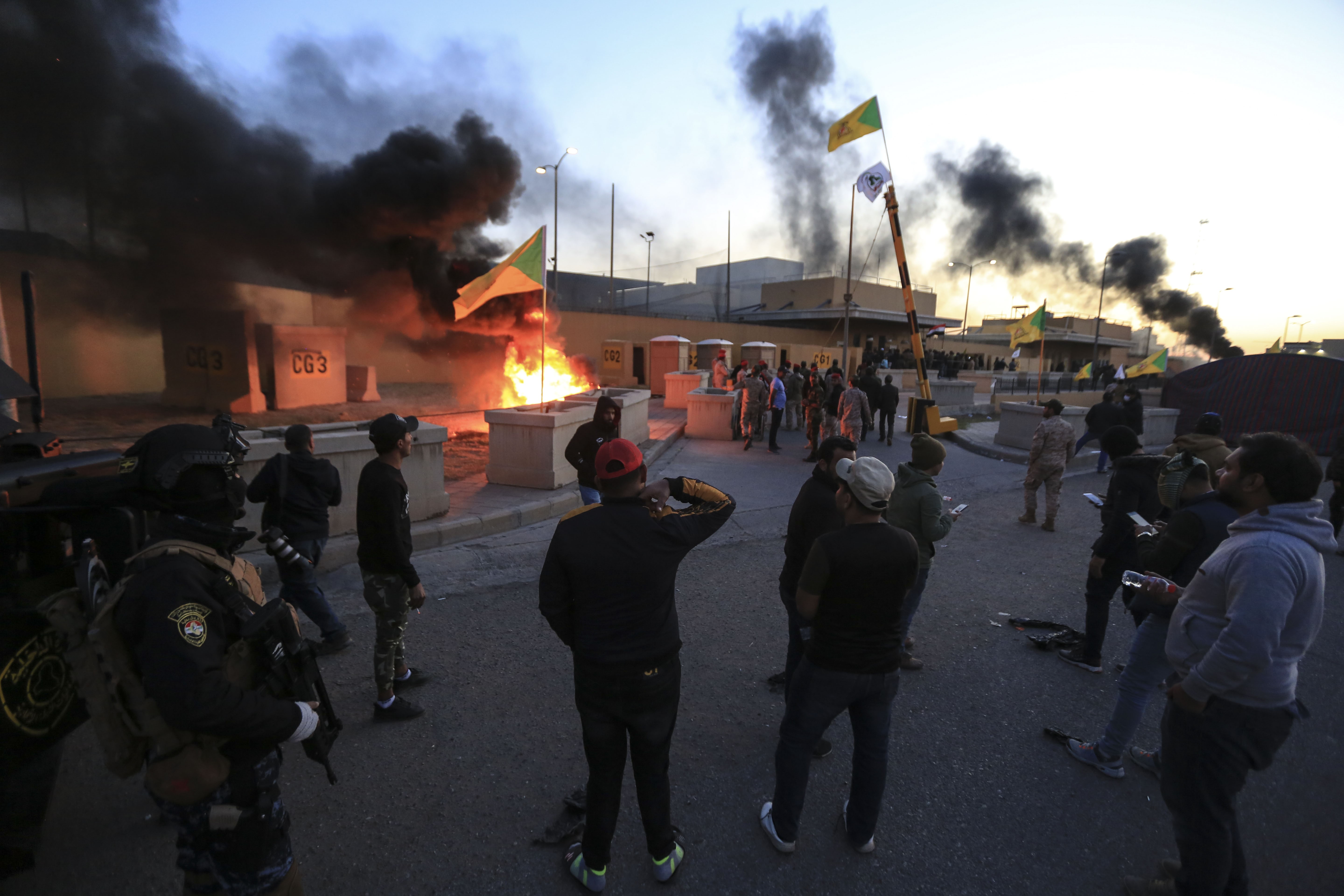 BAGHDAD, IRAQ - DECEMBER 31: Outraged Iraqi protesters storm the U.S. Embassy in Baghdad, protesting Washington&#039;s attacks on armed battalions belong to Iranian-backed Hashd al-Shaabi forces o