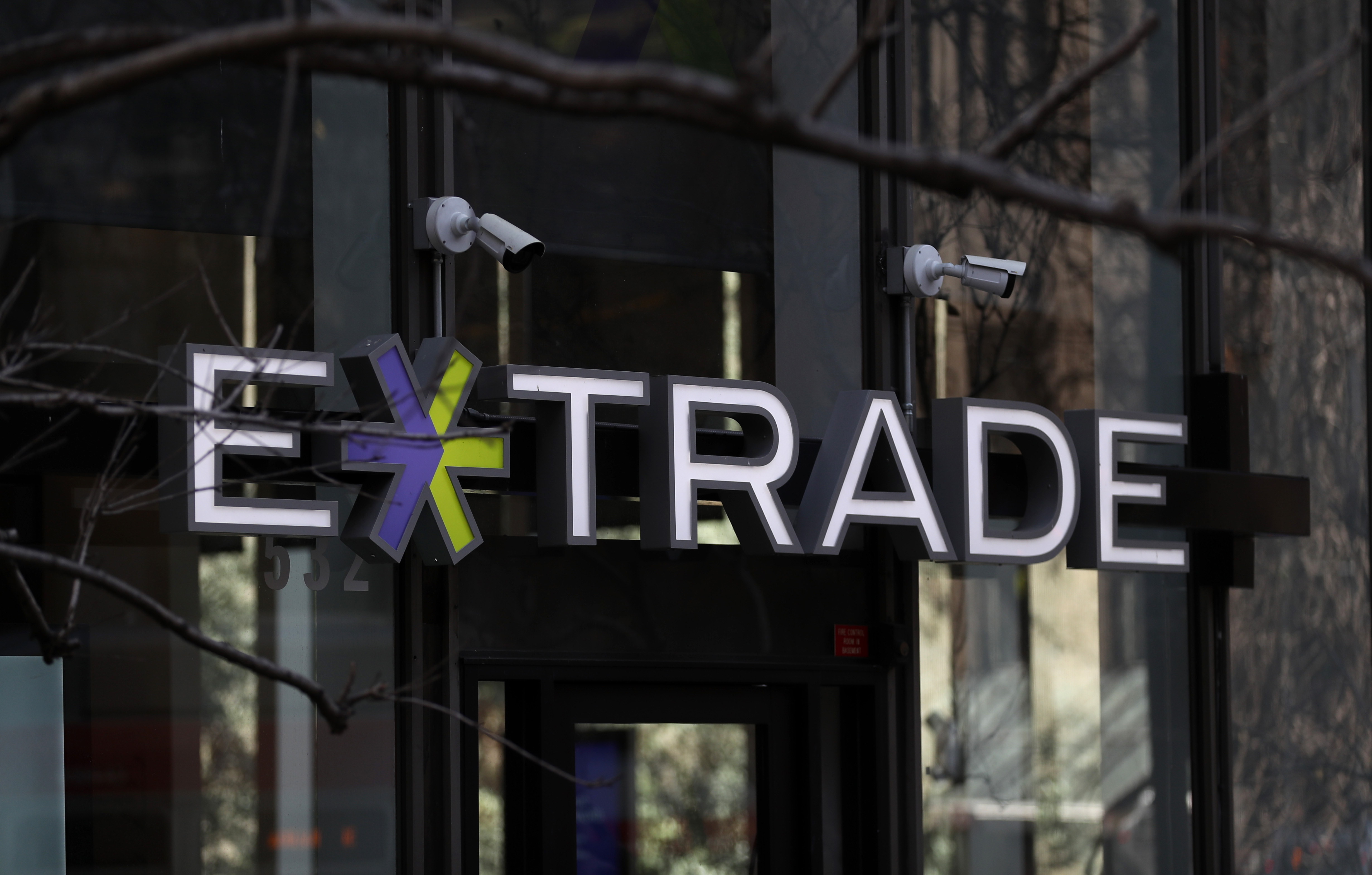 SAN FRANCISCO, CALIFORNIA - FEBRUARY 20: A sign is posted in the exterior of an E*Trade office on February 20, 2020 in San Francisco, California. Morgan Stanley announced plans to buy online 
