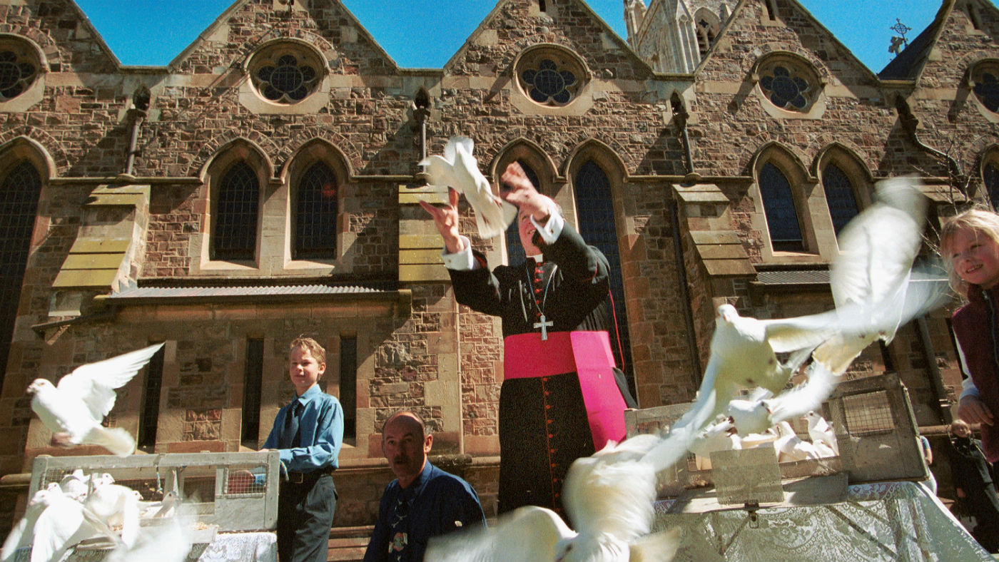  Archbishop of Adelaide Philip Wilson releases white doves with schoolchildren in 2002