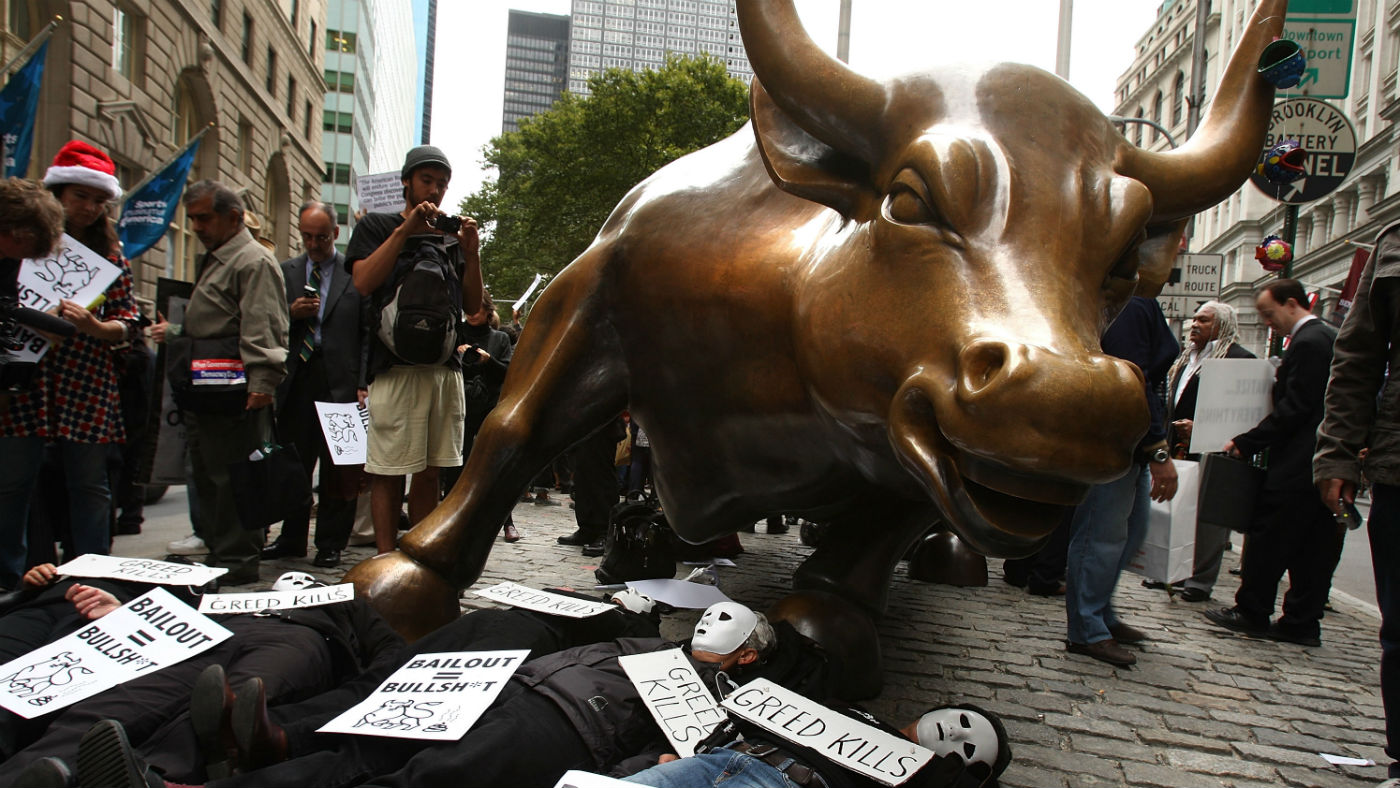 Wall Street&#039;s famous bull is a focus for protesters 