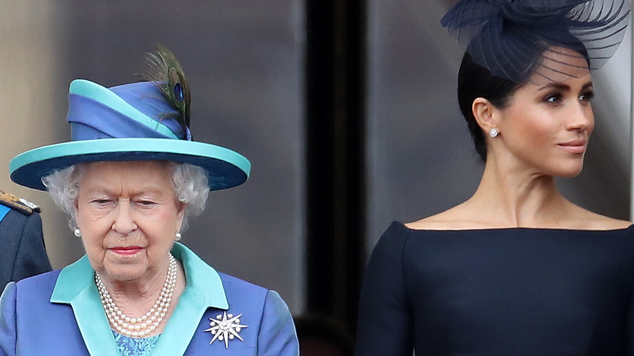 Queen Elizabeth II and Meghan, Duchess of Sussex on the balcony of Buckingham Palace