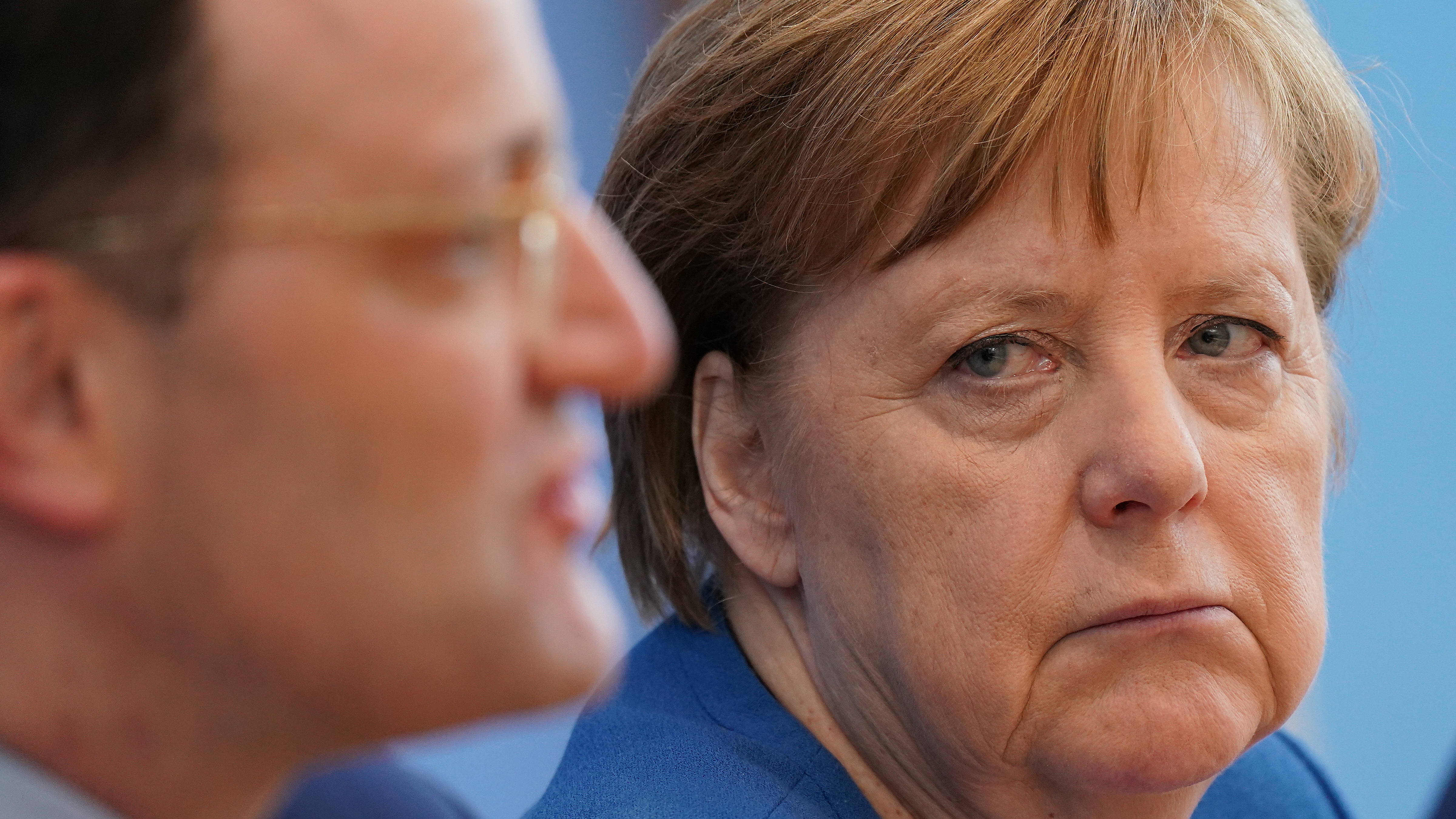 German Chancellor Angela Merkel alongside Health Minister Jens Spahn