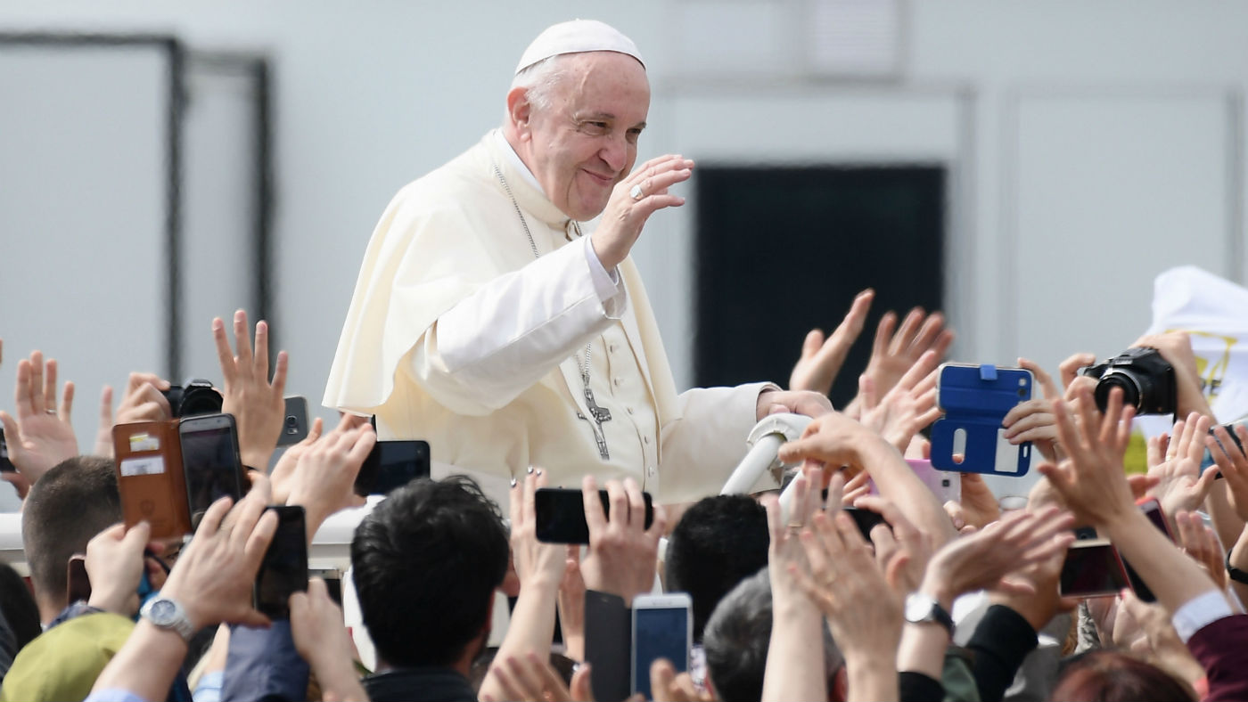 Pope Francis greets adoring crowds in Italy